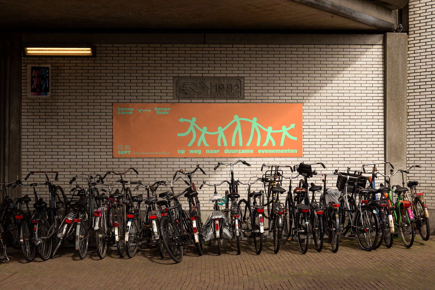 Op Weg poster on a bicycle shelter