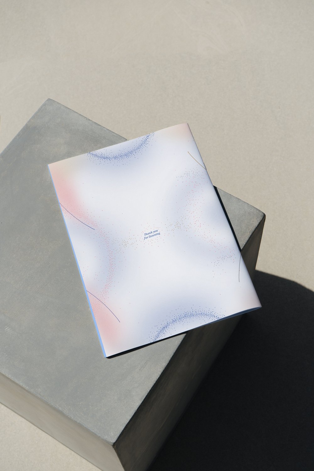 We De Try RISO-printed book cover on a table